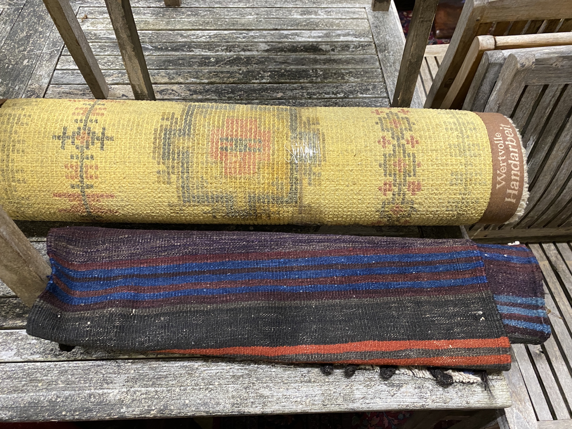 A polychrome flatweave rug, 120 x 70cm together with a Bokhara style rug and one other